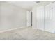 Well-lit bedroom with neutral walls and carpet flooring at 18741 E Elizar Dr, Gold Canyon, AZ 85118