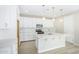 Modern kitchen with white shaker cabinets, quartz countertops, and an island at 18741 E Elizar Dr, Gold Canyon, AZ 85118