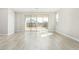Living room with vinyl plank flooring and sliding glass doors at 18741 E Elizar Dr, Gold Canyon, AZ 85118