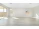 Bright and airy living area with vinyl plank flooring and large windows at 18741 E Elizar Dr, Gold Canyon, AZ 85118