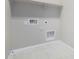 Laundry room with built-in shelving and hookups at 18741 E Elizar Dr, Gold Canyon, AZ 85118