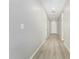 Light and bright hallway with vinyl plank flooring at 18741 E Elizar Dr, Gold Canyon, AZ 85118