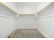 Large walk-in closet with ample shelving and hanging space at 18741 E Elizar Dr, Gold Canyon, AZ 85118
