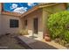 Front entrance with a brick pathway and desert landscaping at 39012 N 8Th St, Phoenix, AZ 85086