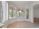 Bright breakfast nook features tile flooring and plantation shutters at 39012 N 8Th St, Phoenix, AZ 85086