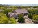 One-story home with a covered patio and mature desert landscaping at 39012 N 8Th St, Phoenix, AZ 85086
