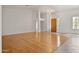 Open concept living room with hardwood floors and natural light at 39012 N 8Th St, Phoenix, AZ 85086