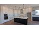 Modern kitchen with ample cabinetry and large island at 4315 S 123Rd Ave, Avondale, AZ 85323