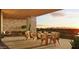 Large patio with outdoor dining set and sunset views at 4849 N Camelback Ridge Rd # B106, Scottsdale, AZ 85251