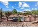 Inviting pool area with a surrounding fence and landscaping at 6310 E Dove Valley Rd, Cave Creek, AZ 85331