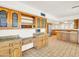 Kitchen features granite countertops and custom wood cabinets at 2237 E Captain Dreyfus Ave, Phoenix, AZ 85022