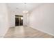 Bright dining room features light flooring and sliding glass door to backyard at 24041 N 171St Ln, Surprise, AZ 85387