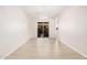 Bright dining room features light flooring and sliding glass door to backyard at 24041 N 171St Ln, Surprise, AZ 85387