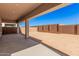 Covered patio overlooking a large backyard at 24041 N 171St Ln, Surprise, AZ 85387