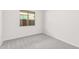 Spacious bedroom with neutral wall and carpet at 24041 N 171St Ln, Surprise, AZ 85387