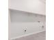 Laundry room with built-in shelving at 24041 N 171St Ln, Surprise, AZ 85387