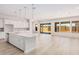 Open concept kitchen with island and living area view at 24041 N 171St Ln, Surprise, AZ 85387