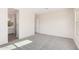 Spacious bedroom with carpeting, an en-suite bathroom, and neutral walls at 24041 N 171St Ln, Surprise, AZ 85387