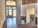 Open entryway with view of living room and additional room at 6547 E Sierra Morena St, Mesa, AZ 85215