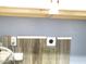 Kitchen backsplash with reclaimed wood and white trim at 6547 E Sierra Morena St, Mesa, AZ 85215