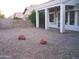 Spacious backyard with gravel and rock accents at 6547 E Sierra Morena St, Mesa, AZ 85215