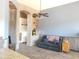 Relaxing living room featuring a leather couch and built-in shelving at 6547 E Sierra Morena St, Mesa, AZ 85215