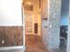 Elegant hallway with tile flooring and wood paneling at 6547 E Sierra Morena St, Mesa, AZ 85215