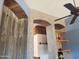 Rustic kitchen boasts unique architectural details and wood accents at 6547 E Sierra Morena St, Mesa, AZ 85215