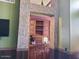 Wet bar with custom cabinetry and tile accents at 6547 E Sierra Morena St, Mesa, AZ 85215