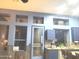 Bright kitchen with unique built-in features and wood details at 6547 E Sierra Morena St, Mesa, AZ 85215