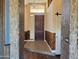 Inviting entryway with wood and tile accents and a dark door at 6547 E Sierra Morena St, Mesa, AZ 85215