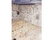 Kitchen counter with granite countertop and stone backsplash at 6547 E Sierra Morena St, Mesa, AZ 85215