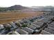 Aerial view of neighborhood, showing homes and surrounding landscape at 914 W Desert Seasons Dr, San Tan Valley, AZ 85143