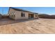 Large backyard with sandy ground and partial home view at 24030 N 171St Dr, Surprise, AZ 85387