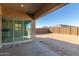 Covered patio with sliding glass doors and view of backyard at 24030 N 171St Dr, Surprise, AZ 85387