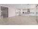 Open concept kitchen with island and modern appliances at 24030 N 171St Dr, Surprise, AZ 85387