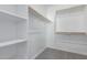 Large walk-in closet with shelves and hanging rods at 24030 N 171St Dr, Surprise, AZ 85387