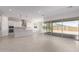 Modern kitchen with a large island, white cabinets, and pendant lighting at 24030 N 171St Dr, Surprise, AZ 85387