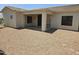 Covered patio with gravel yard and stone pathway at 2101 S Meridian Rd # 215, Apache Junction, AZ 85120