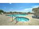 Community pool and spa with ample deck space for relaxing at 2101 S Meridian Rd # 215, Apache Junction, AZ 85120