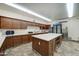 Modern kitchen with island and refrigerator at 2101 S Meridian Rd # 215, Apache Junction, AZ 85120