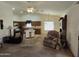 Open living room featuring a kitchen and comfortable seating at 2101 S Meridian Rd # 215, Apache Junction, AZ 85120