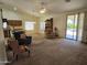 Bright living room with comfortable seating and access to backyard at 2101 S Meridian Rd # 215, Apache Junction, AZ 85120