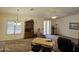 Living room with access to patio and kitchen island at 2101 S Meridian Rd # 215, Apache Junction, AZ 85120
