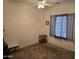 Simple bedroom with a small nightstand and window at 2101 S Meridian Rd # 215, Apache Junction, AZ 85120