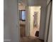Home hallway with bathroom and bedroom access at 2101 S Meridian Rd # 215, Apache Junction, AZ 85120