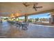 Covered patio with ceiling fans and seating area at 2101 S Meridian Rd # 215, Apache Junction, AZ 85120