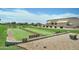 Well-maintained bocce ball court with benches nearby at 2101 S Meridian Rd # 215, Apache Junction, AZ 85120