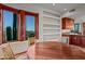 Bright kitchen nook boasts a wooden table, built-in shelves, and scenic views at 10284 E Filaree Ln, Scottsdale, AZ 85262
