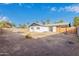Backyard view of home with large yard at 2033 W Sunnyside Ave, Phoenix, AZ 85029